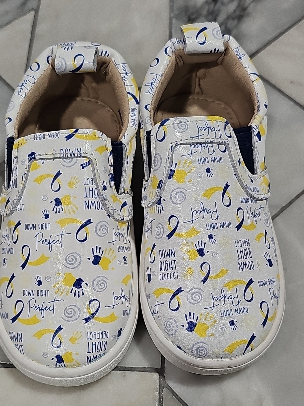 Monkey Feet White Slip-On Sneakers with Blue & Yellow Prints 12-18 Months